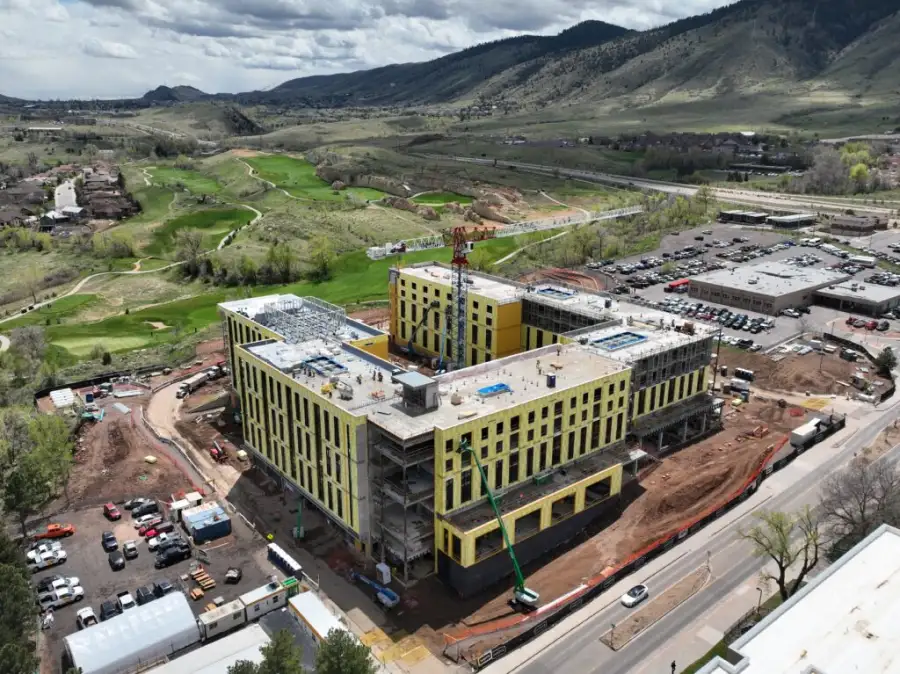 Drone inspecting commercial construction site